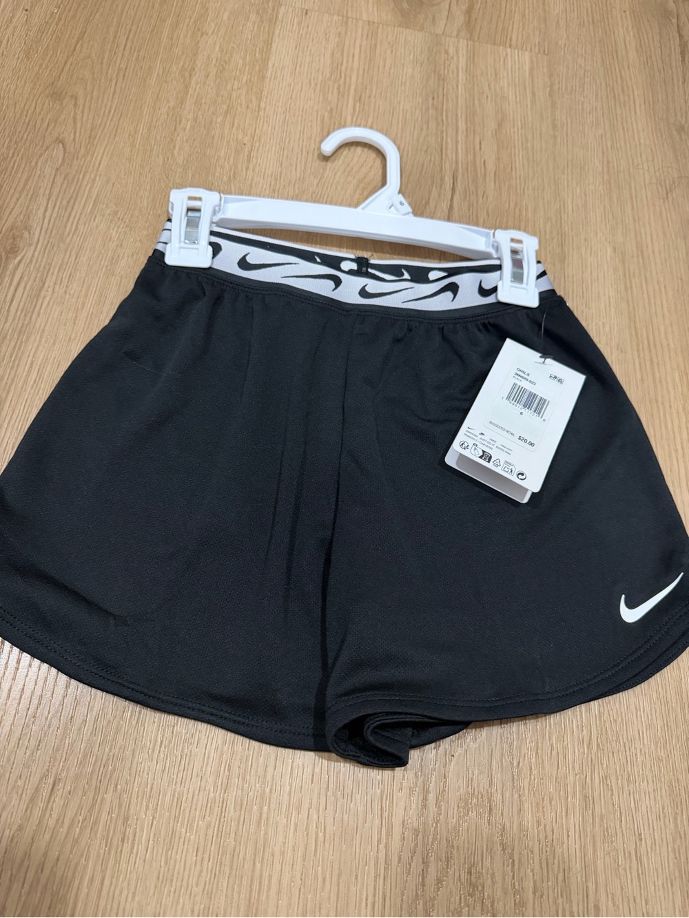 Nike Girls Black Athletic Shorts with White Swoosh Waistband